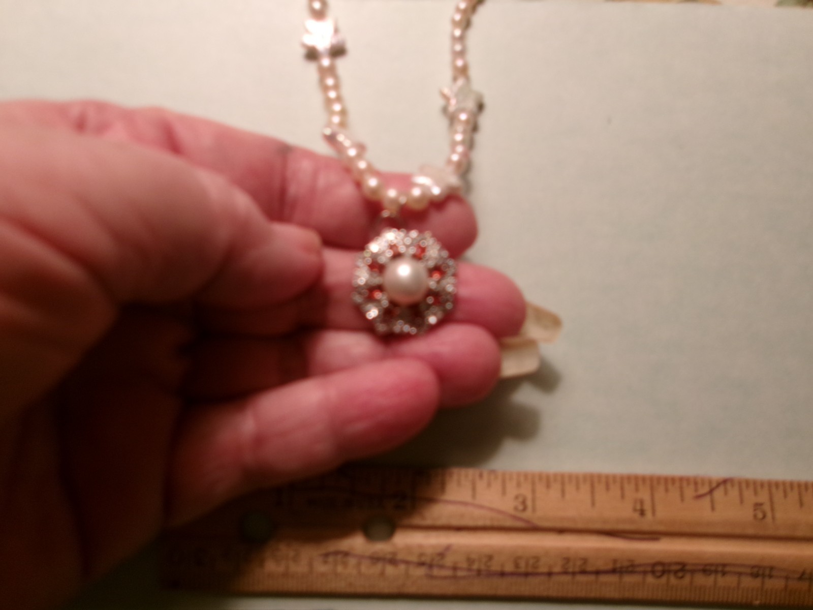 PEARL BRACELET WITH REAL PEARLS I MADE THIS ONE W HITE STARS PINKISH N WHIT