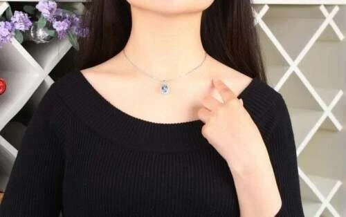 2.00Ct Pear Cut Lab Created Aquamarine Halo Pendant 14K White Gold Silver Plated