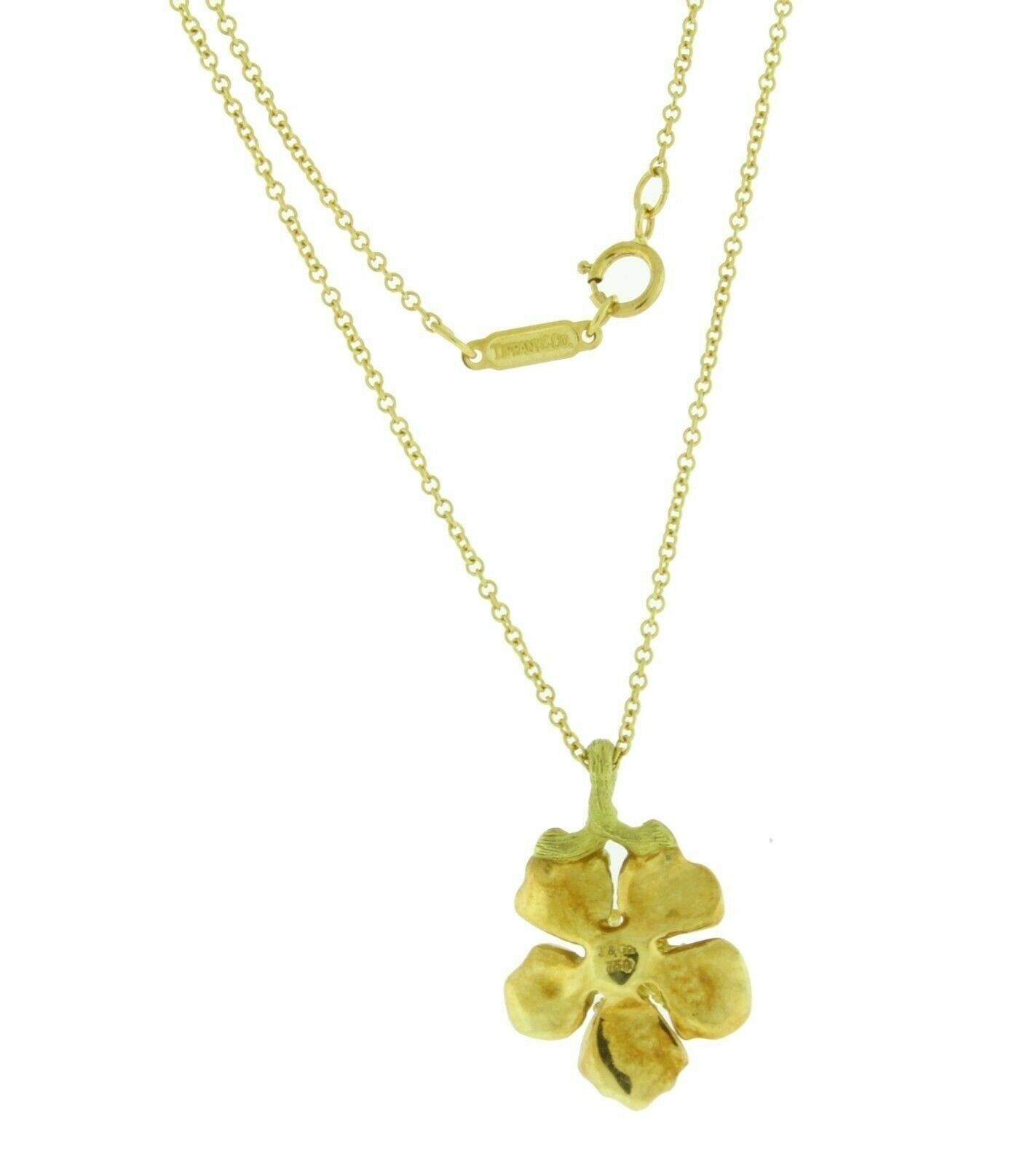 Vintage Tiffany & Co flower necklace in 18k yellow gold in very good condition