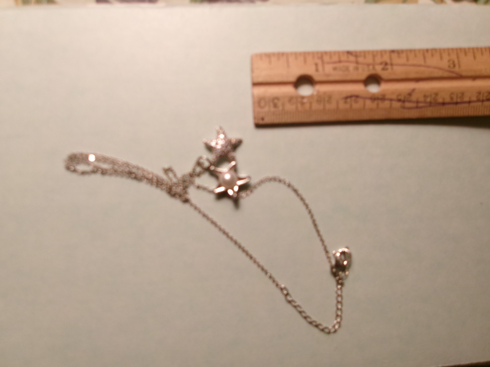 PEARL IN 2 STAR FISH NECKLACE