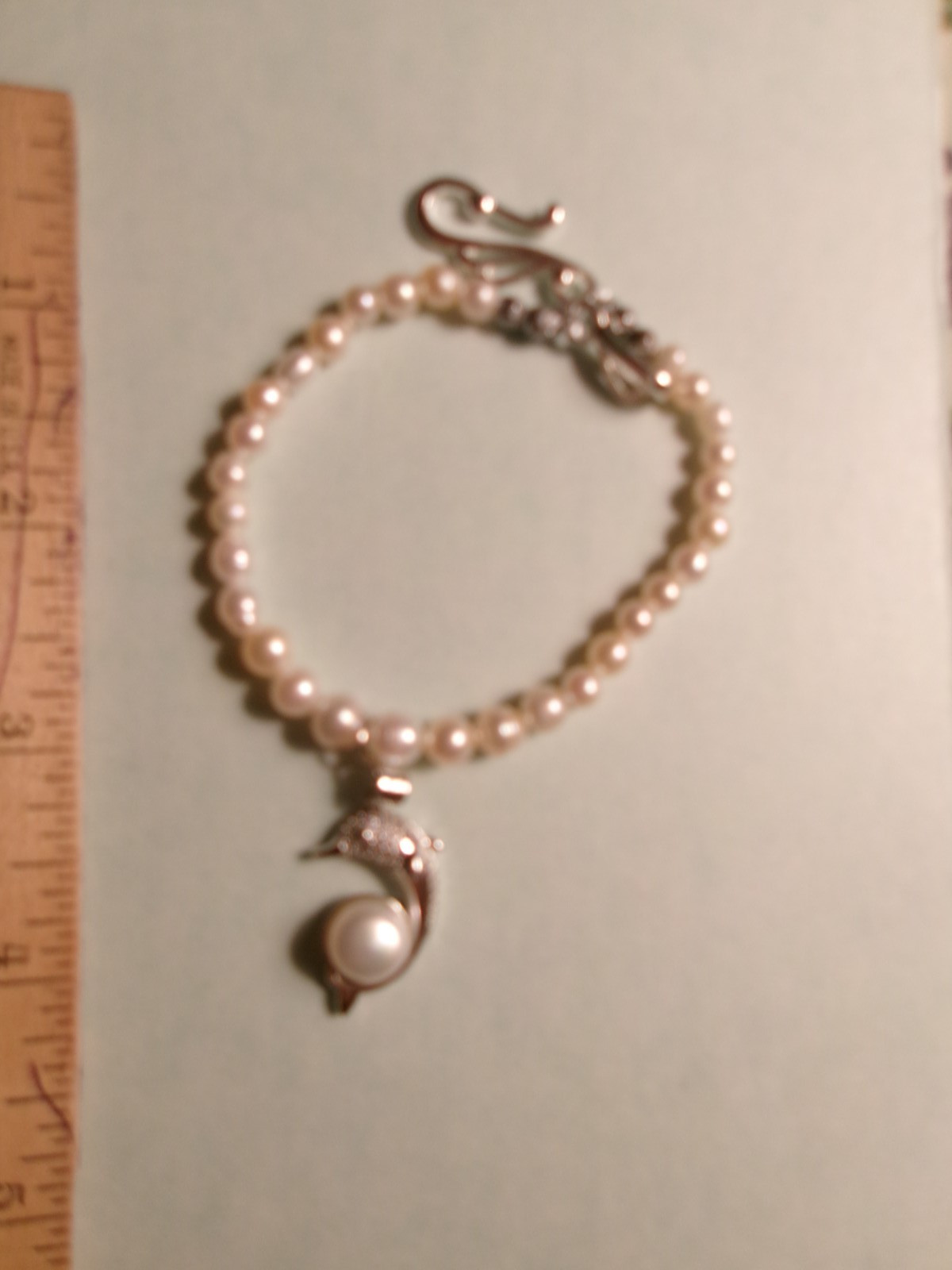 PEARL BRACELET WITH REAL PEARLS I MADE THIS ONE DOLPHIN SO PRETTY