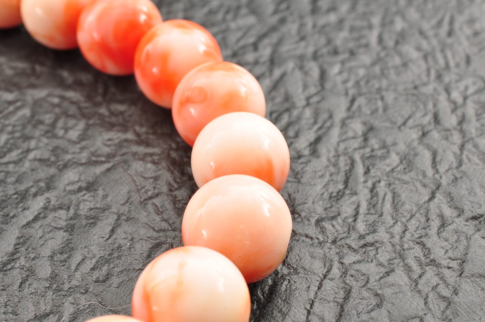 Angel skin coral necklace (17.3in, 423ct) ,925 silver clasp with “Certificate”.