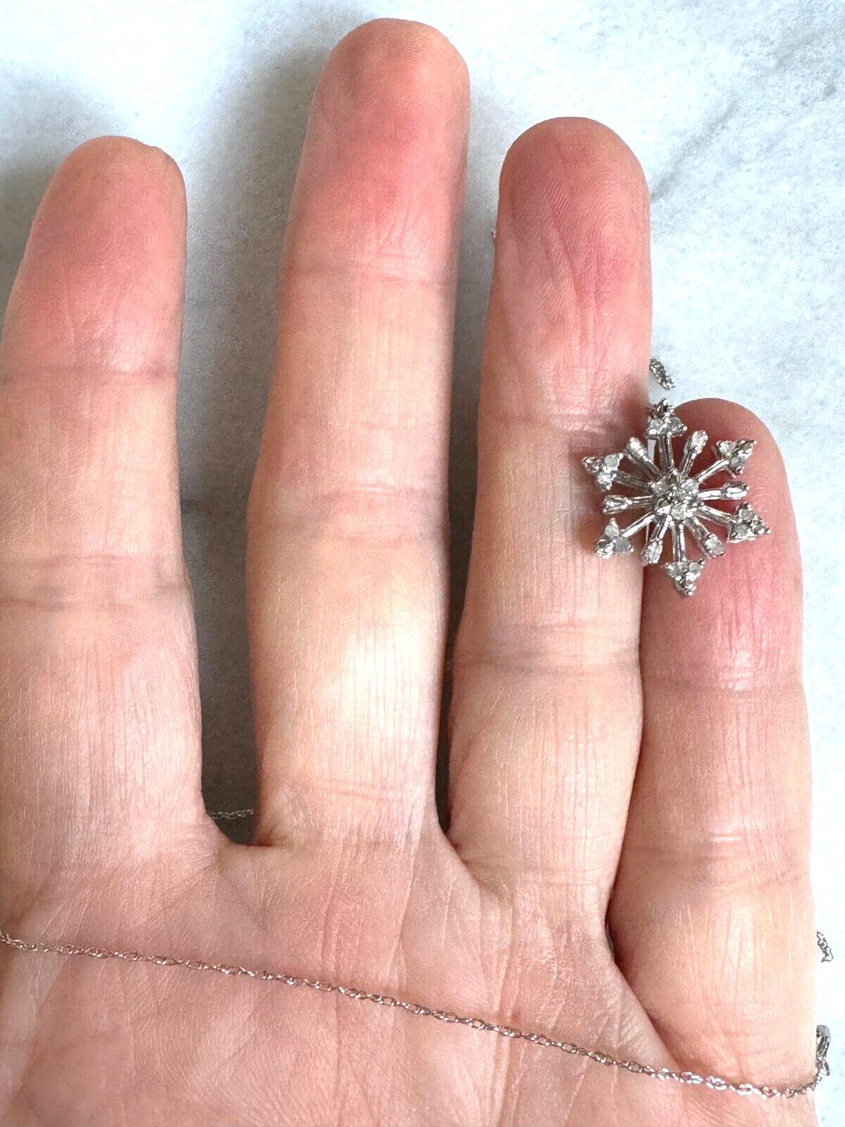 WHITE GOLD AND COLORLESS SAPPHIRE SNOWFLAKE PENDANT NECKLACE