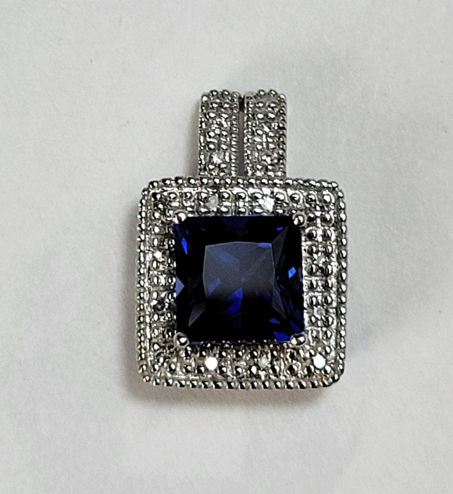 10k White Gold Pendant/Blue Topaz 2.0 CT/.50 TCW Si1-i Color DM/2.3 Grams