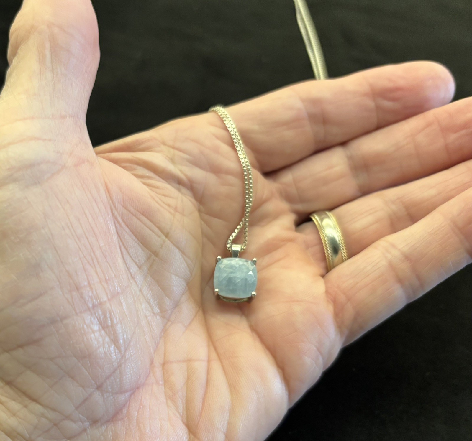 24 Sterling Silver 1mm Chain with Sterling Box Mounted Pale Blue Stone..925