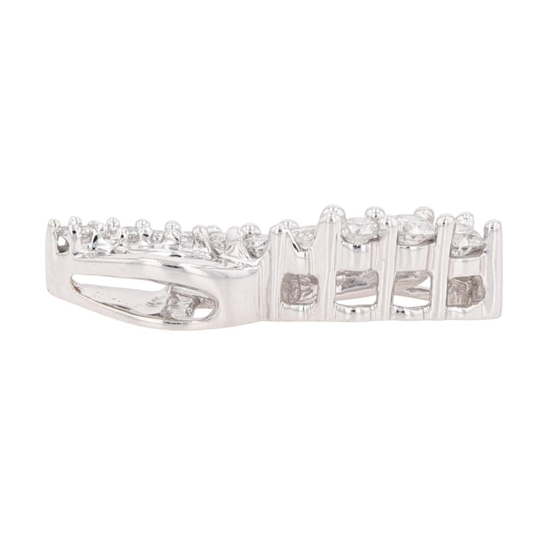 .63ctw Round and Baguette Cut Diamond Twist Pendant without Chain 10k White Gold