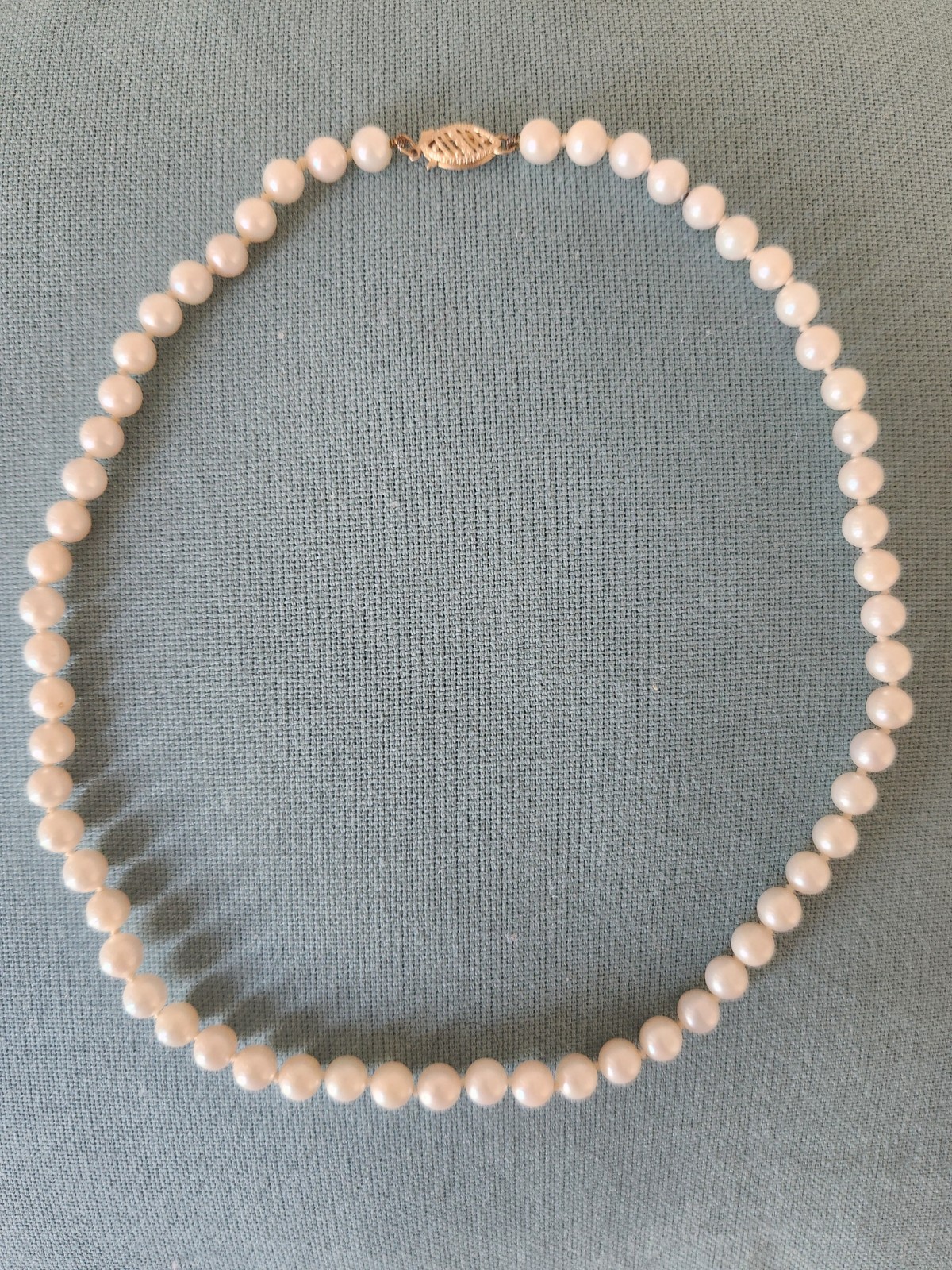 saltwater pearl 16 inch necklace. Beautiful individually tied 7 mm pearls. 14 c