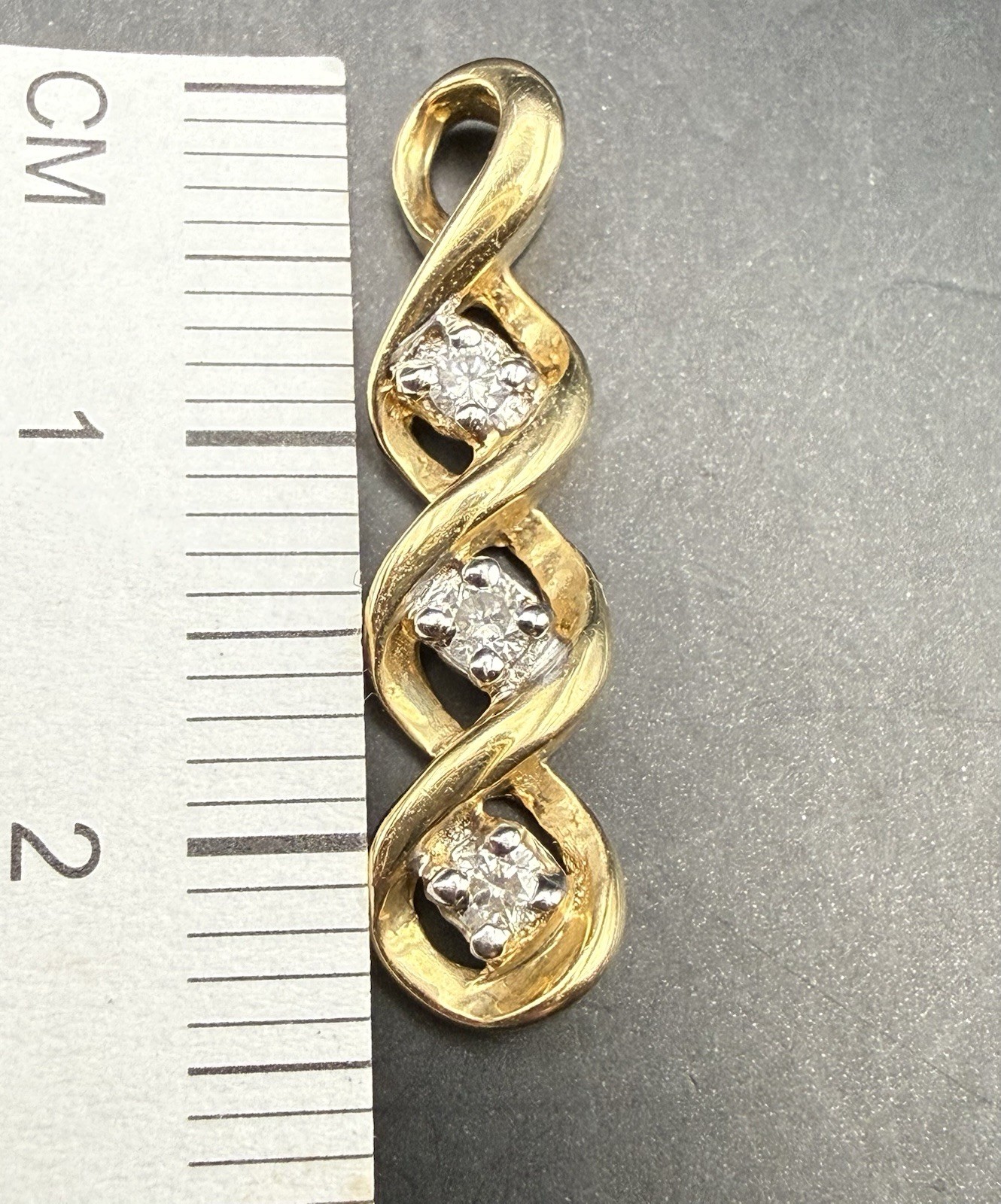 10K Yellow Gold Triple Infinity Pendant/charm featuring 3 genuine diamonds 1.4g
