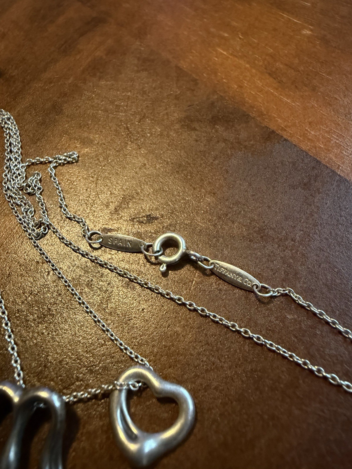 Tiffany & Co. Elsa Peretti Alphabet Initial Letter “M” And Open Heart Pendant