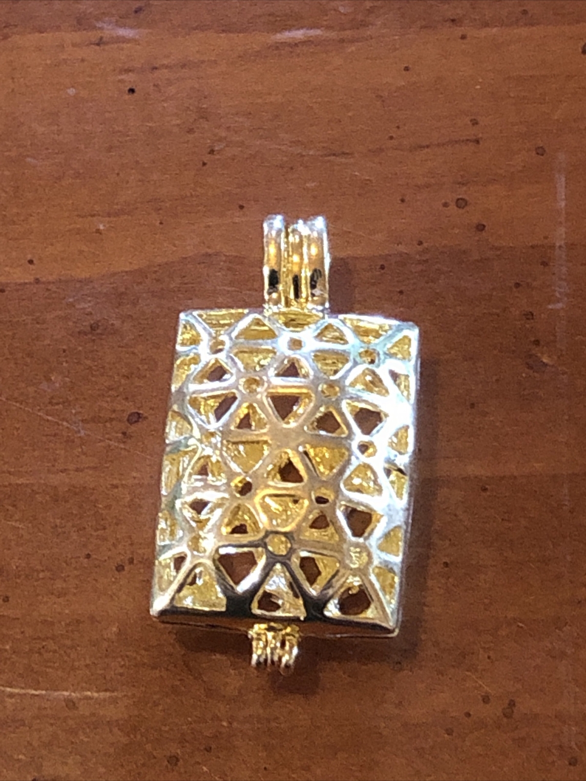 keepsake locked gold pendant