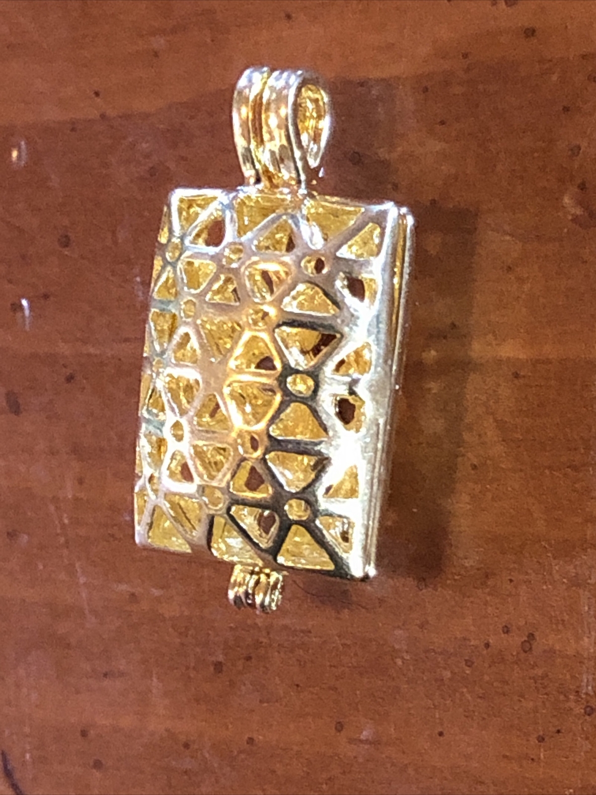keepsake locked gold pendant
