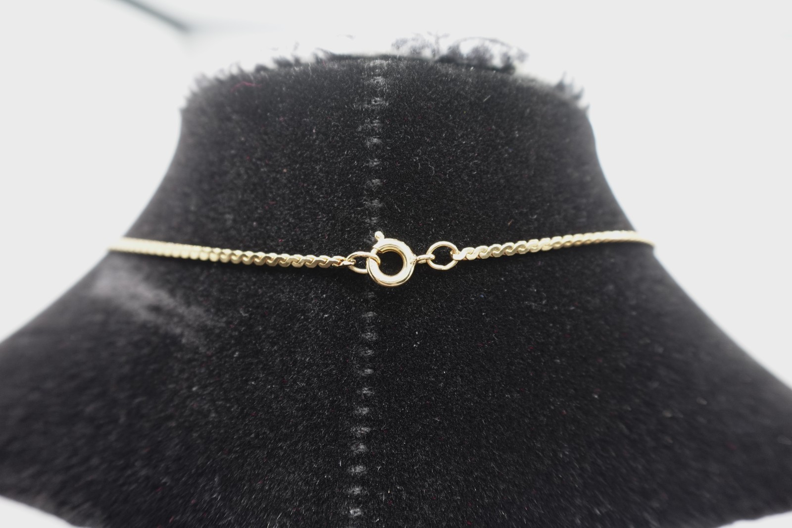 10k stamped gold pendant with unknown stones clasp on chain is stamped 1/2012