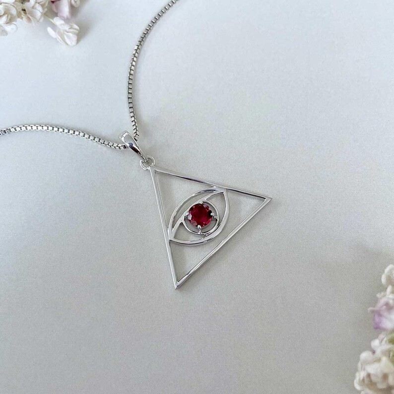 Lab Created Garnet Tringle Evil Eye Pendant for Women’s 14K White Gold Plated