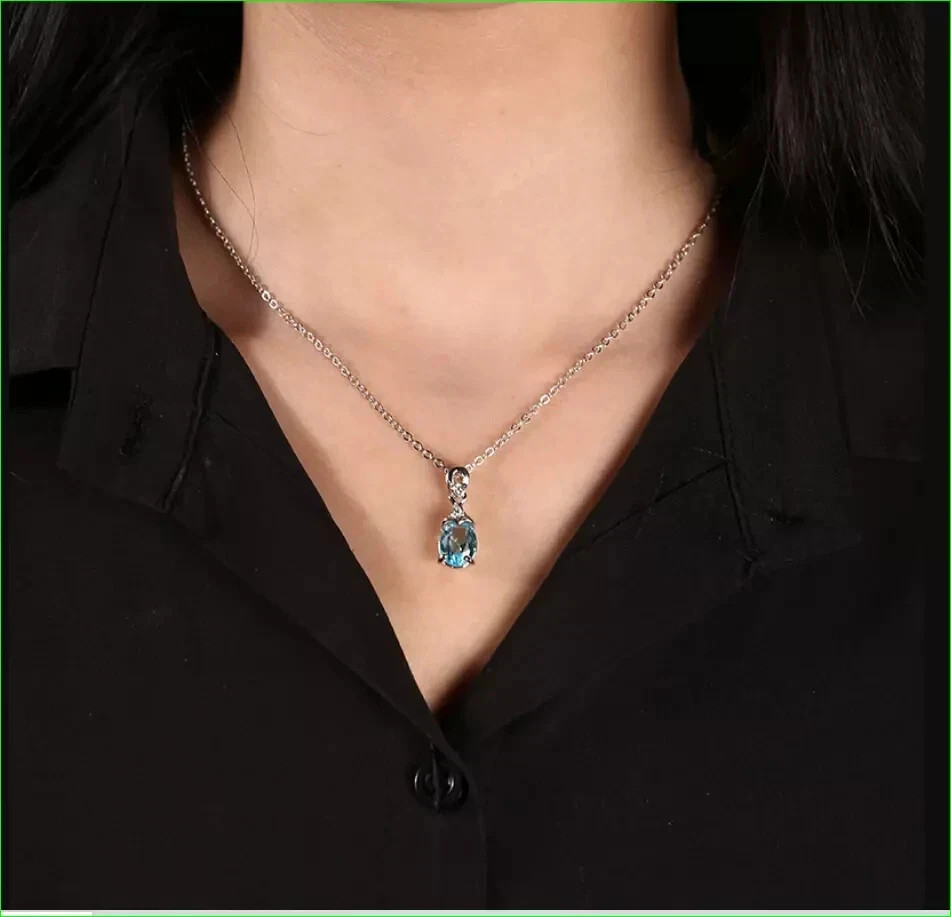 Oval Aquamarine Teardrop Solitaire Pendant with White Gold Finish Free Chain