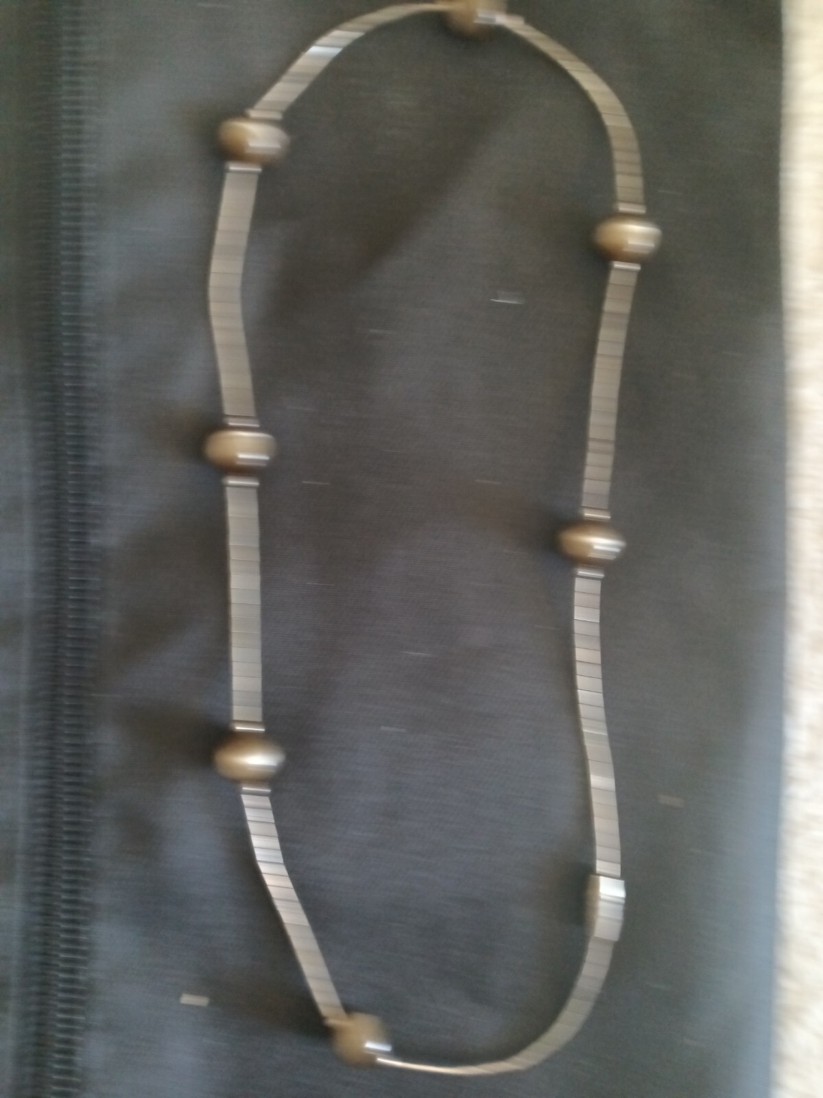 Sterling liquid silver/7 cats eye beads necklace 16 in- wgt 8 grams.
