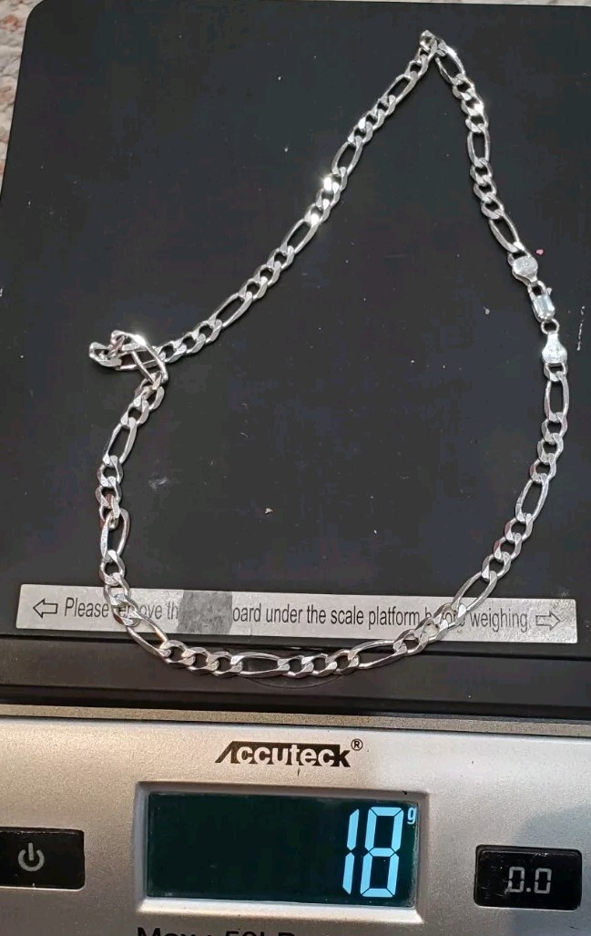 18 inch 5.5mm figaro silver chain, very good condition
