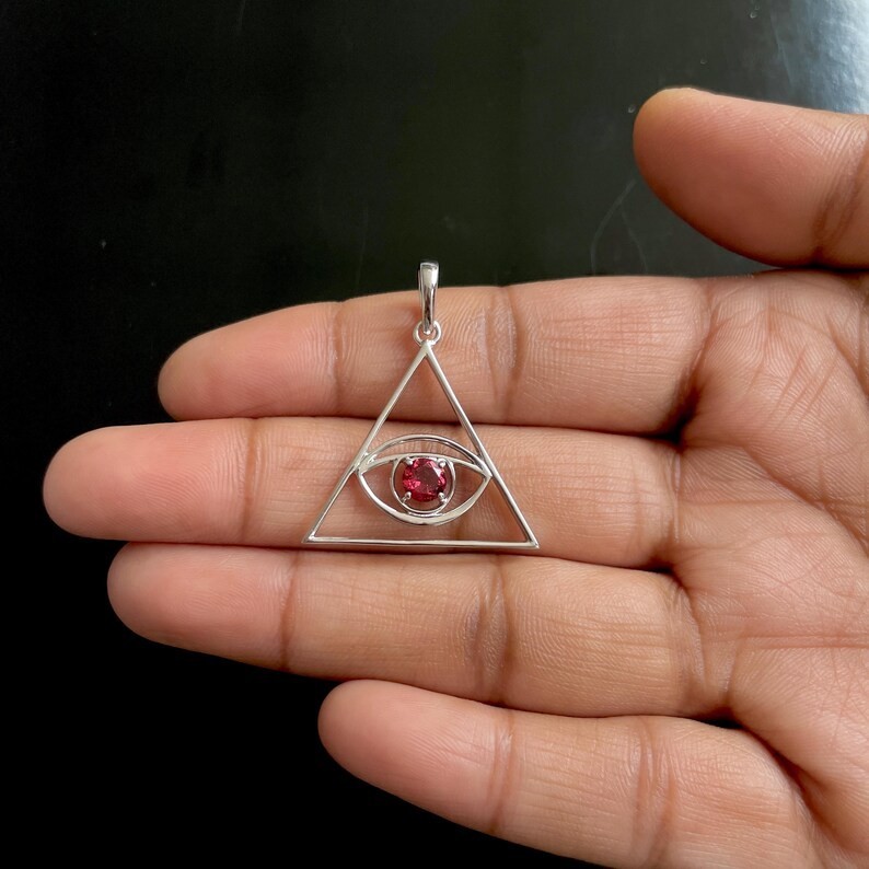 Lab Created Garnet Tringle Evil Eye Pendant for Women’s 14K White Gold Plated