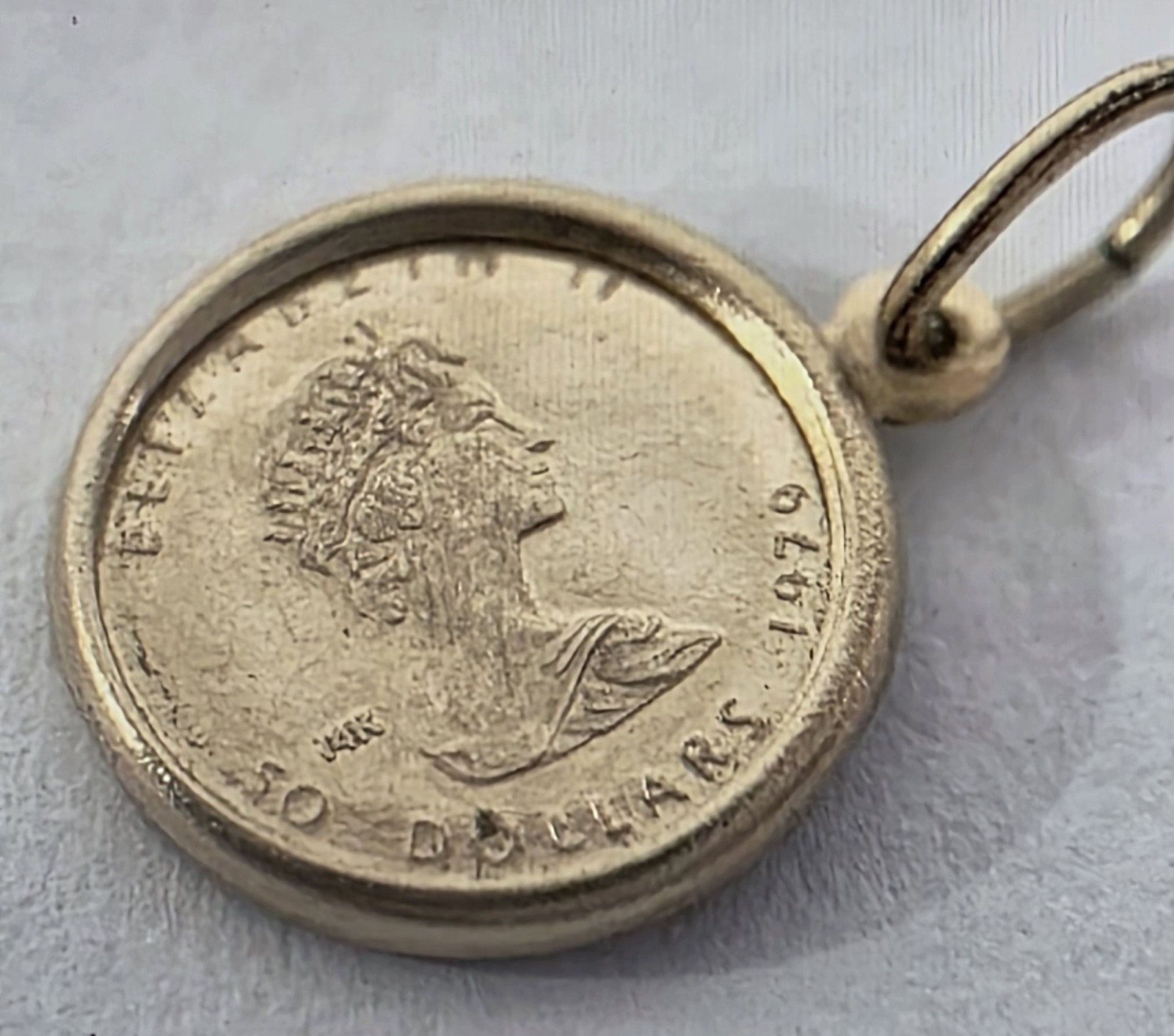14k 1979 Canada 50 Dollar .29 Gram Coin Pendant