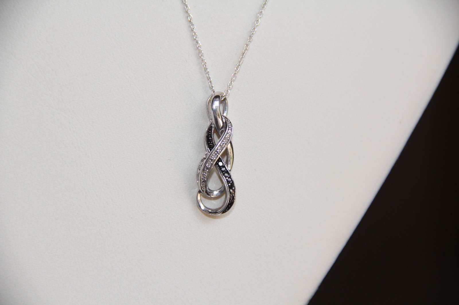 Sterling Silver Black and White Diamonds Infinity Pendant Necklace