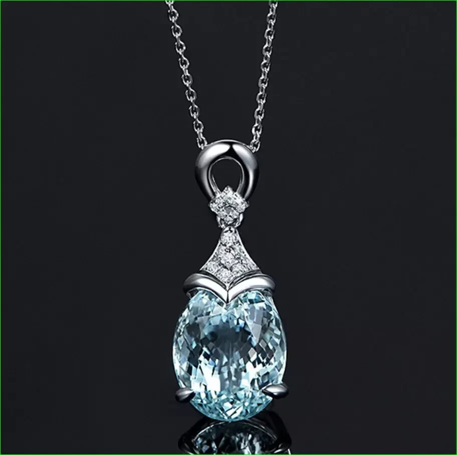 Oval Aquamarine Teardrop Solitaire Pendant with White Gold Finish Free Chain
