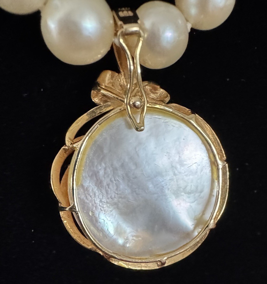 14k YG Blister Pearl, Bow, Ribbon and Ruby Enhancer Pendant 7.25 grams