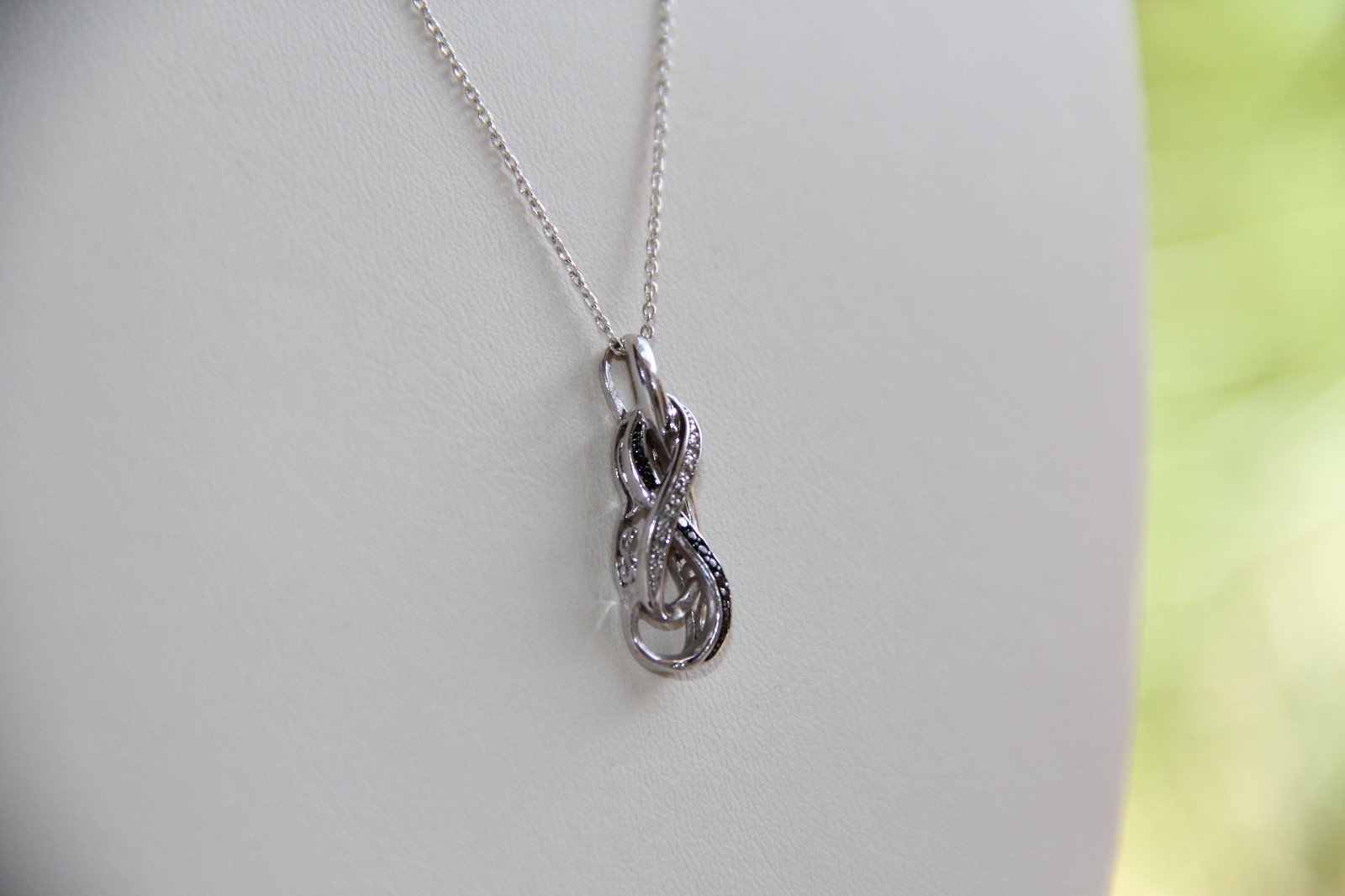 Sterling Silver Black and White Diamonds Infinity Pendant Necklace