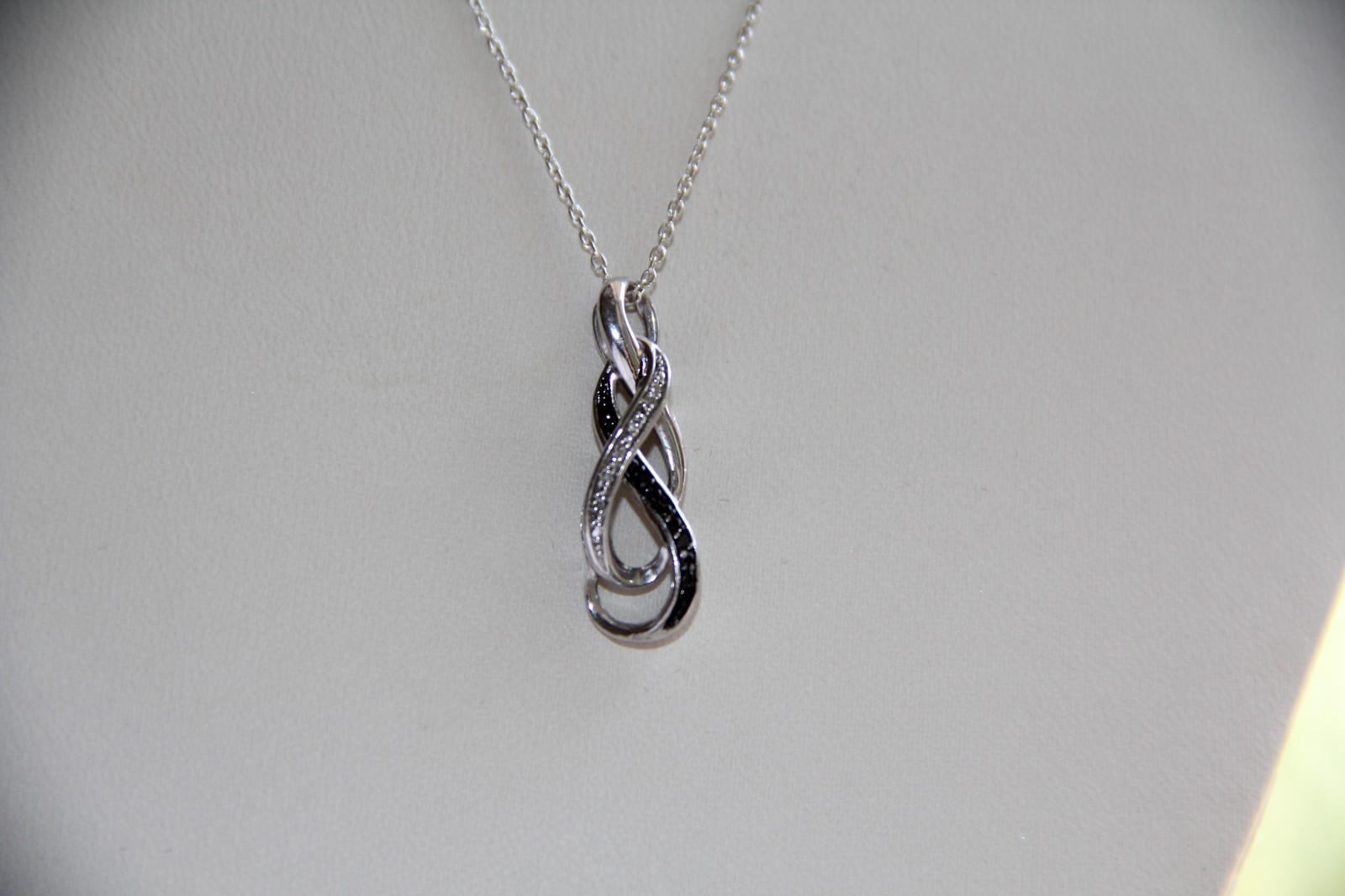 Sterling Silver Black and White Diamonds Infinity Pendant Necklace