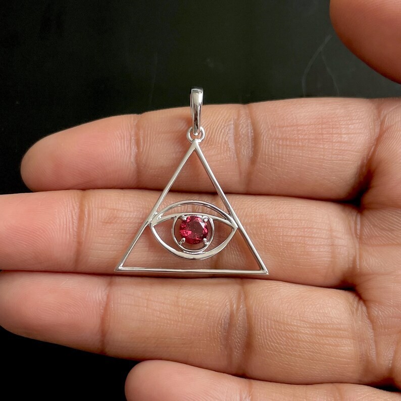 Lab Created Garnet Tringle Evil Eye Pendant for Women’s 14K White Gold Plated