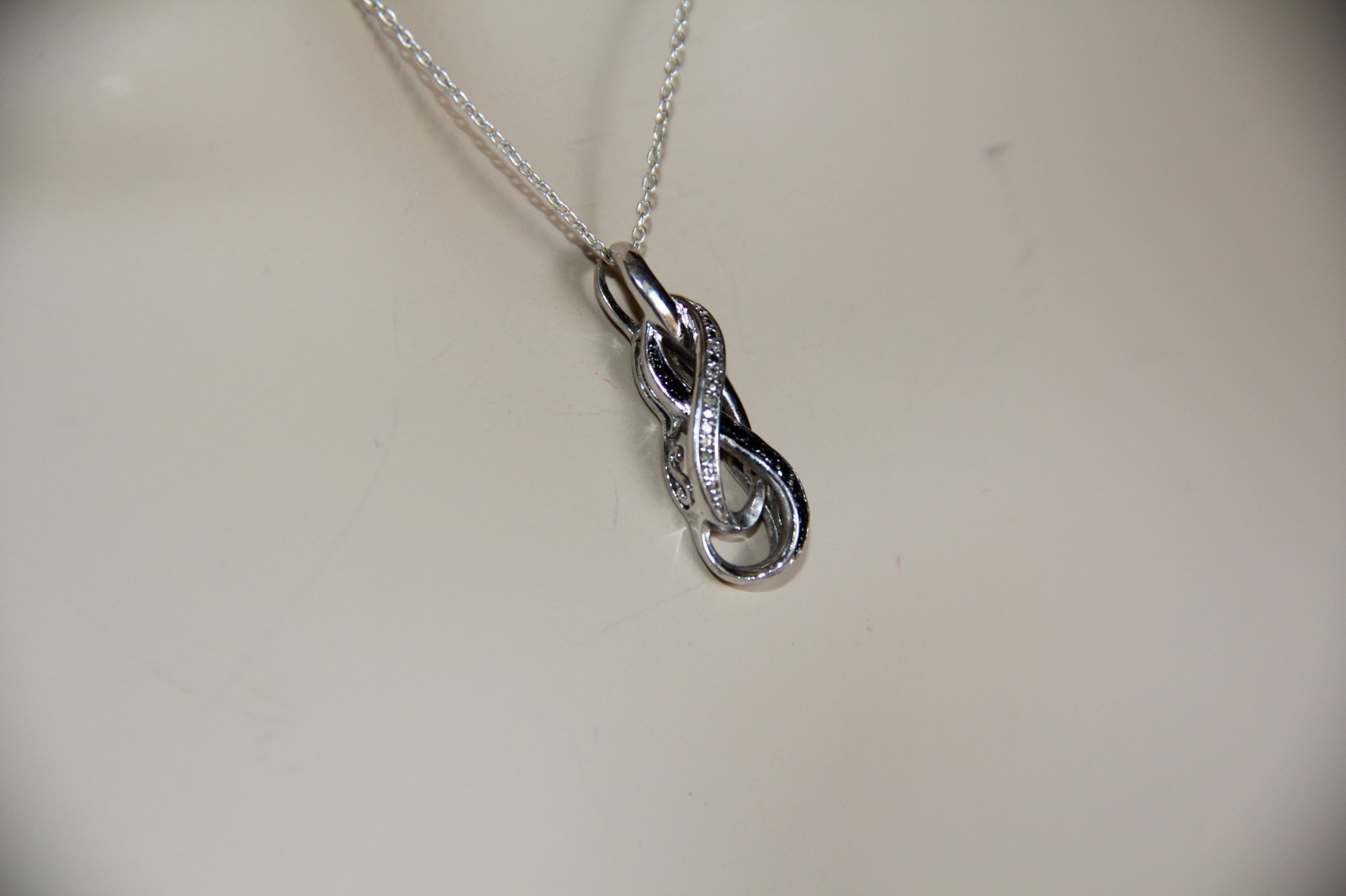 Sterling Silver Black and White Diamonds Infinity Pendant Necklace