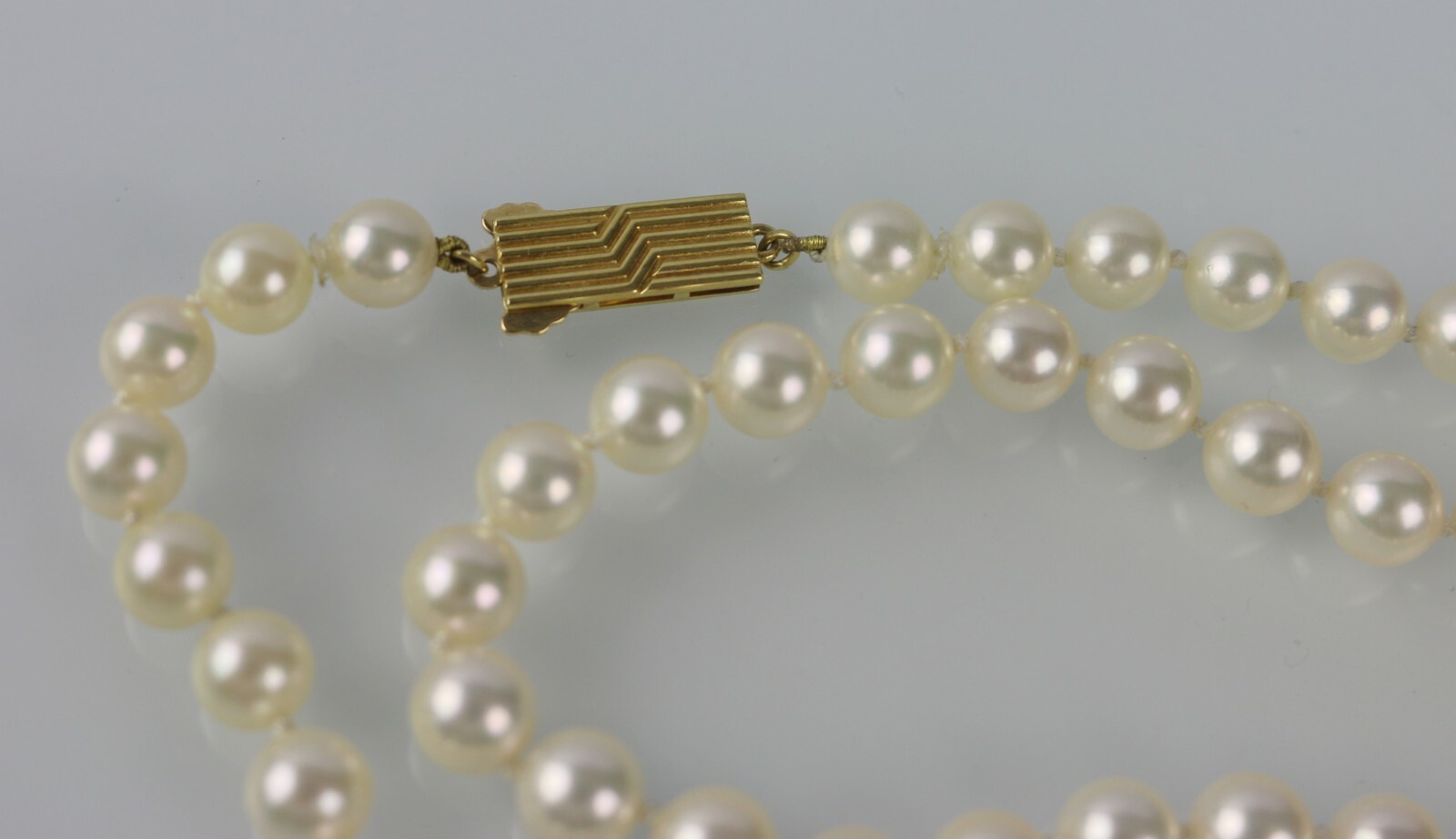 Mikimoto Vintage 6.5mm~7mm Pearl 23.5″ Strand Necklace w/ 18K Gold Clasp