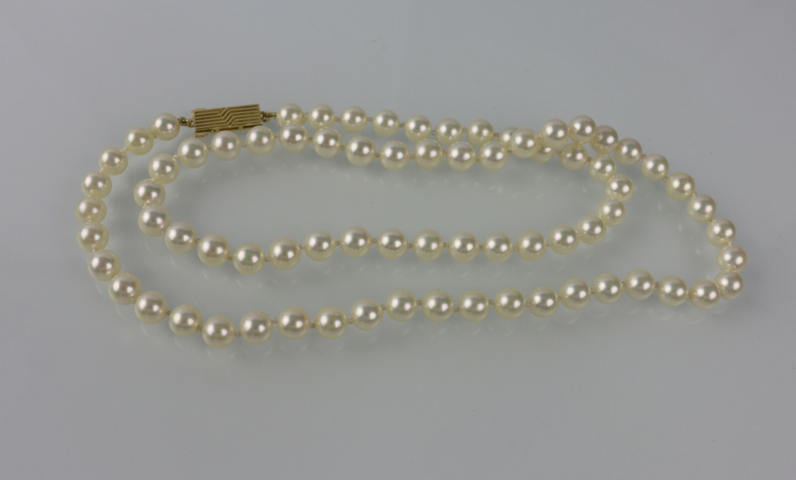 Mikimoto Vintage 6.5mm~7mm Pearl 23.5″ Strand Necklace w/ 18K Gold Clasp