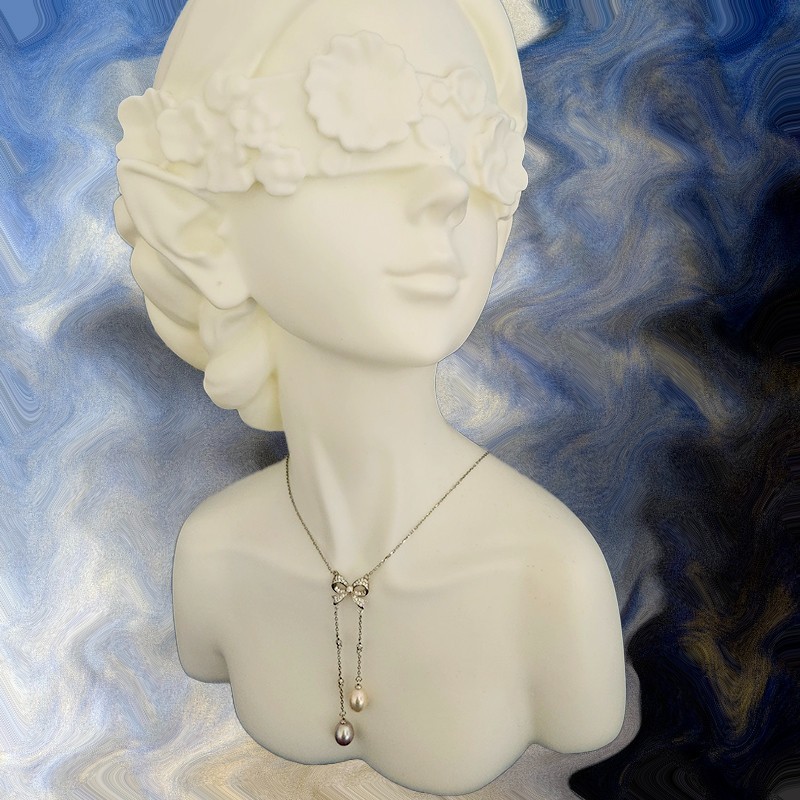 925 Sterling Silver Butterfly Knot with Fresh Water Pearl Tassels