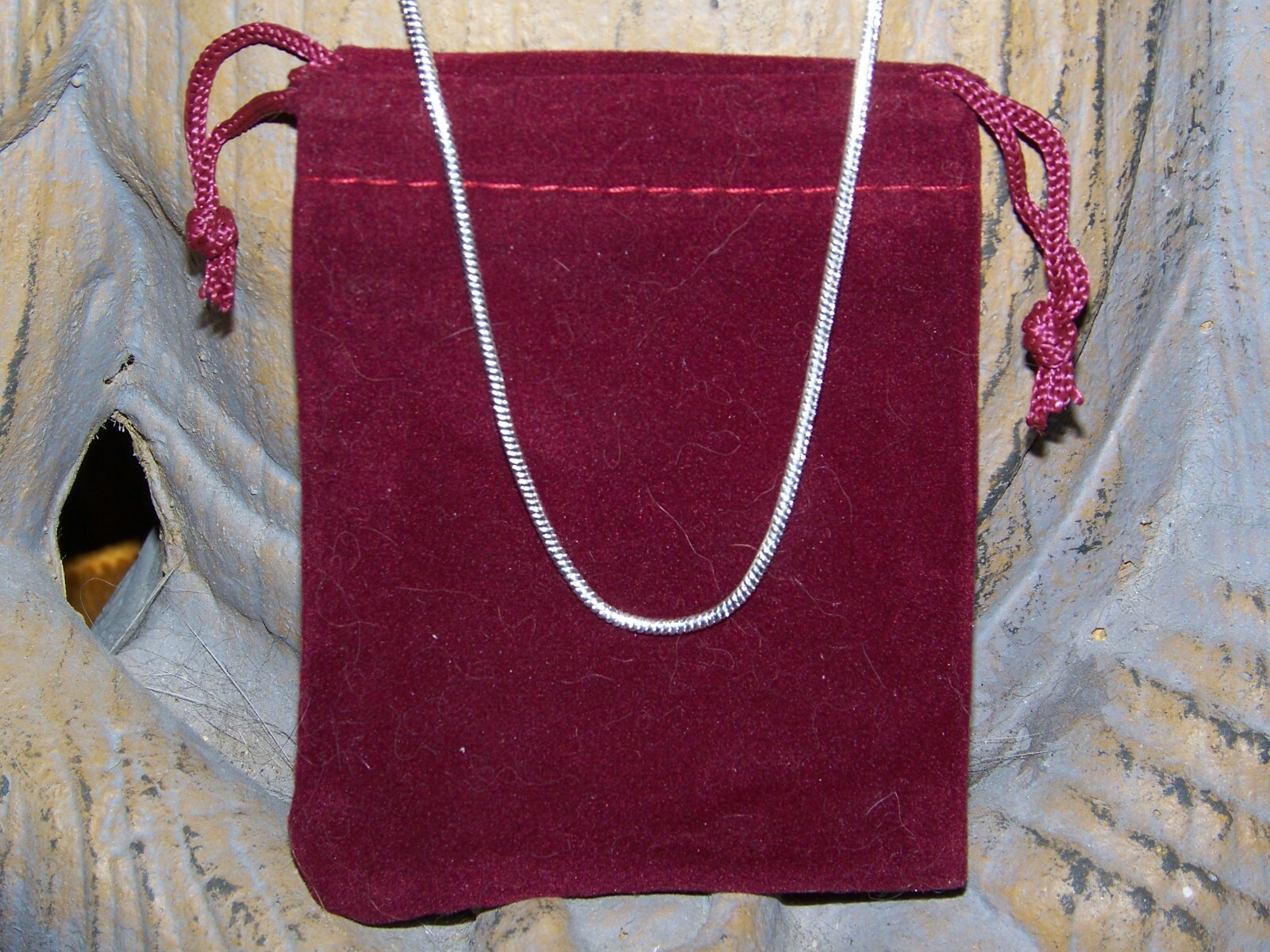 Morgan Silver Dollar in Sterling bezel on a 2mm 16–30-inch sterling necklace.