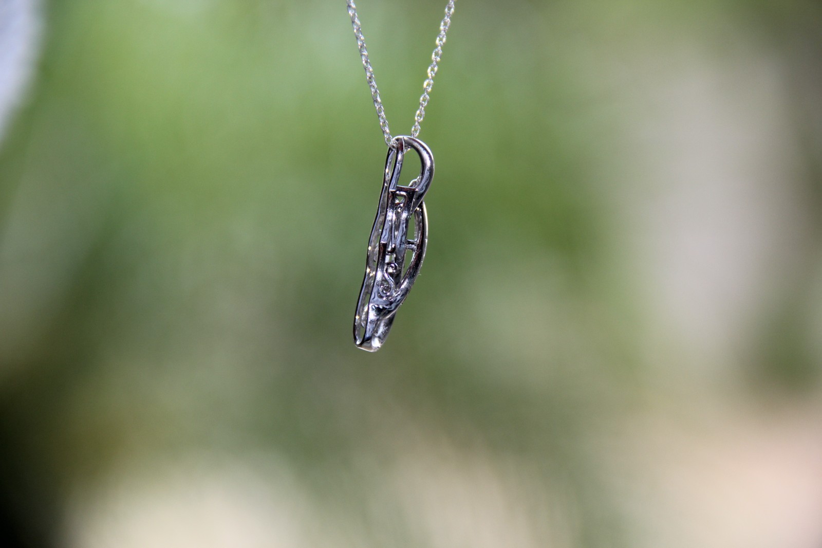 Sterling Silver Black and White Diamonds Infinity Pendant Necklace