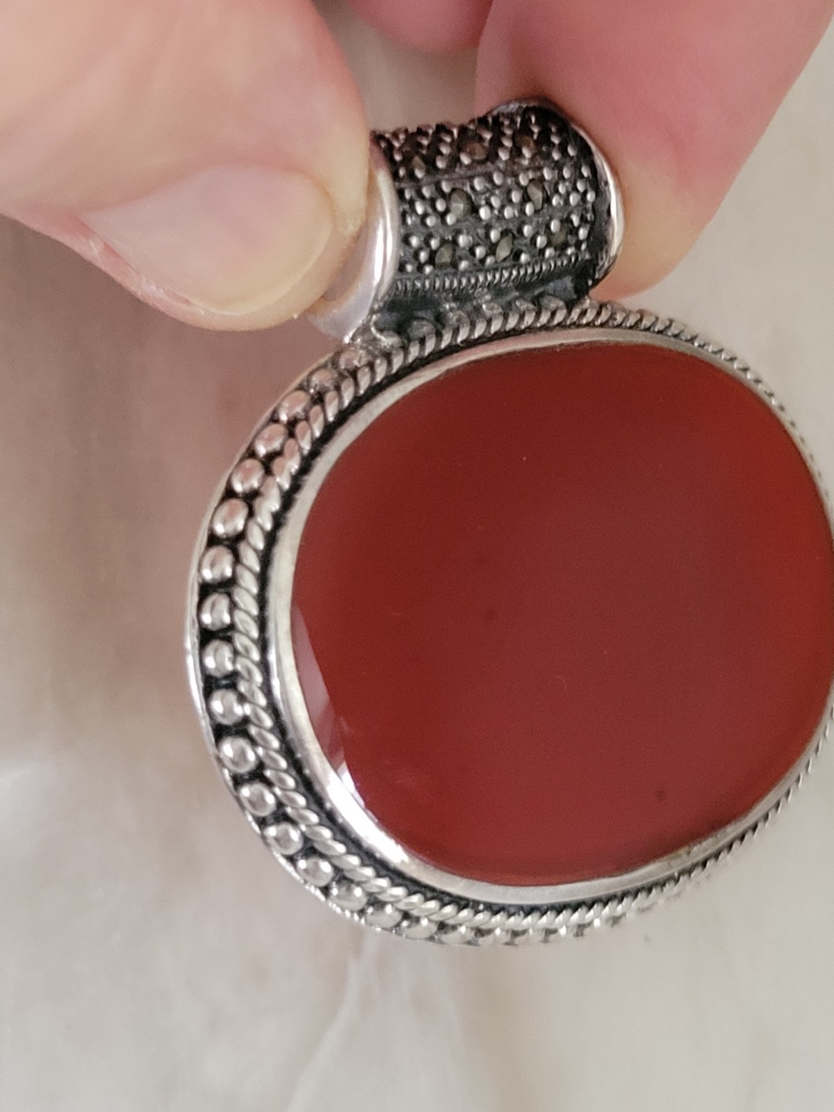 FINE CARNELIAN OVAL PENDANT, STERLING/ LARGE ROUND MARCASITE BALE