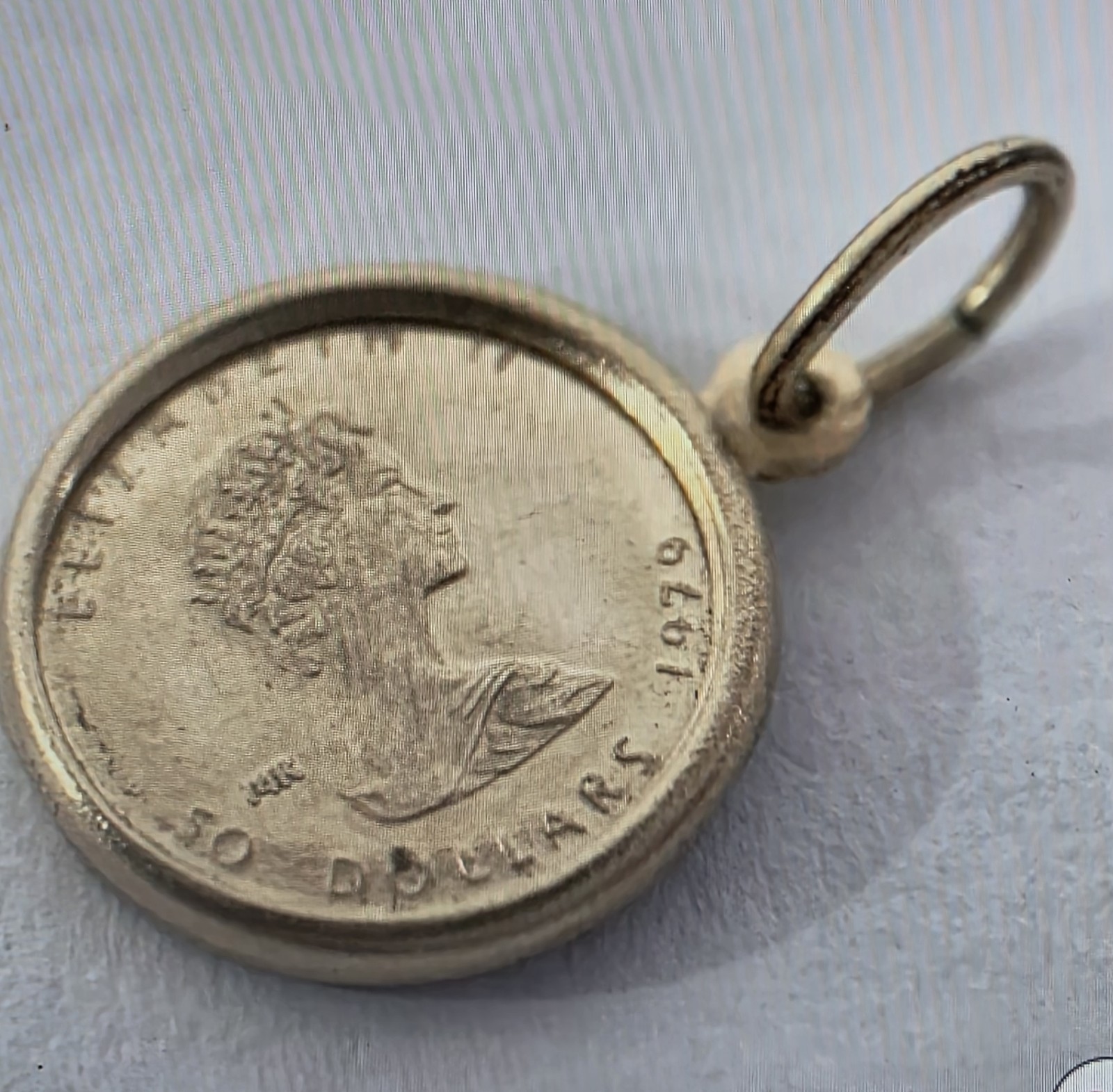 14k 1979 Canada 50 Dollar .29 Gram Coin Pendant