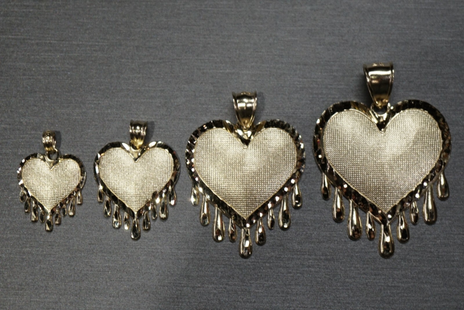 10K Solid Yellow Gold Diamond Cut Bleeding Love Tear Drop Heart Charm Pendant.