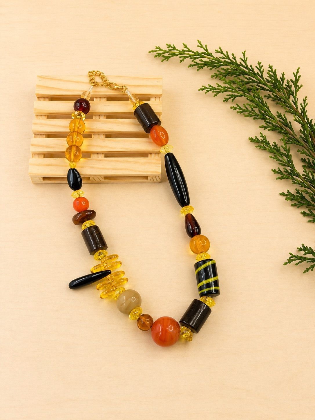 Boho Necklace Featuring Yellow-to-Brown Glass Beads in Various Shapes