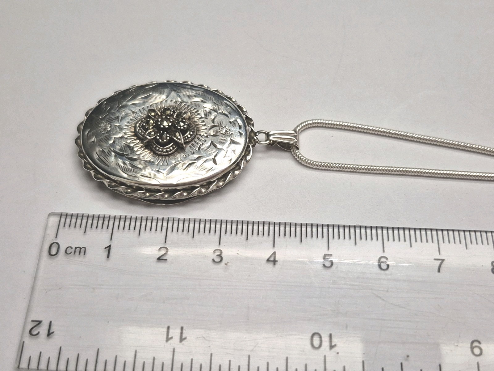 LOCKET – Fully Hallmarked Sterling Silver and Marcasite Double Photo Locket.
