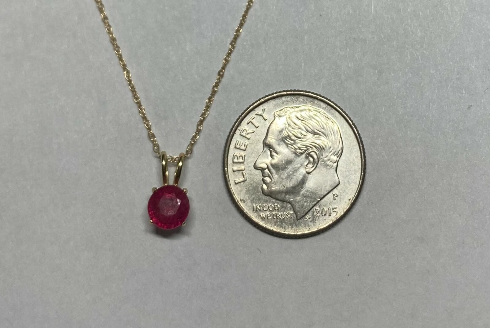 14K Genuine 4mm Round Ruby Pendant (Available with or without chain)