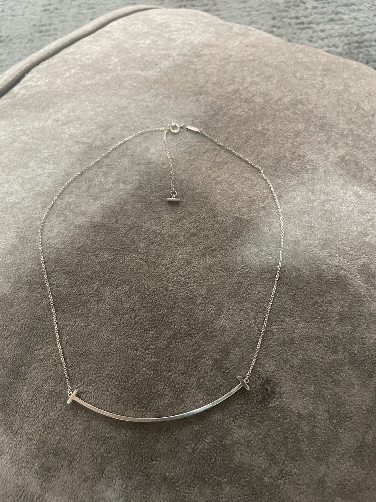 Tiffany & Co. Small T Smile Pendant Necklace Sterling Silver 16–18″