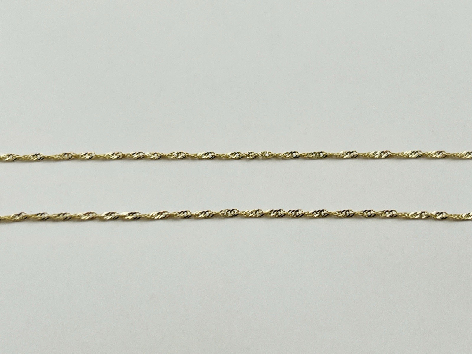 14k Yellow Gold 1mm Singapore Link Chain Necklace 16 Inches