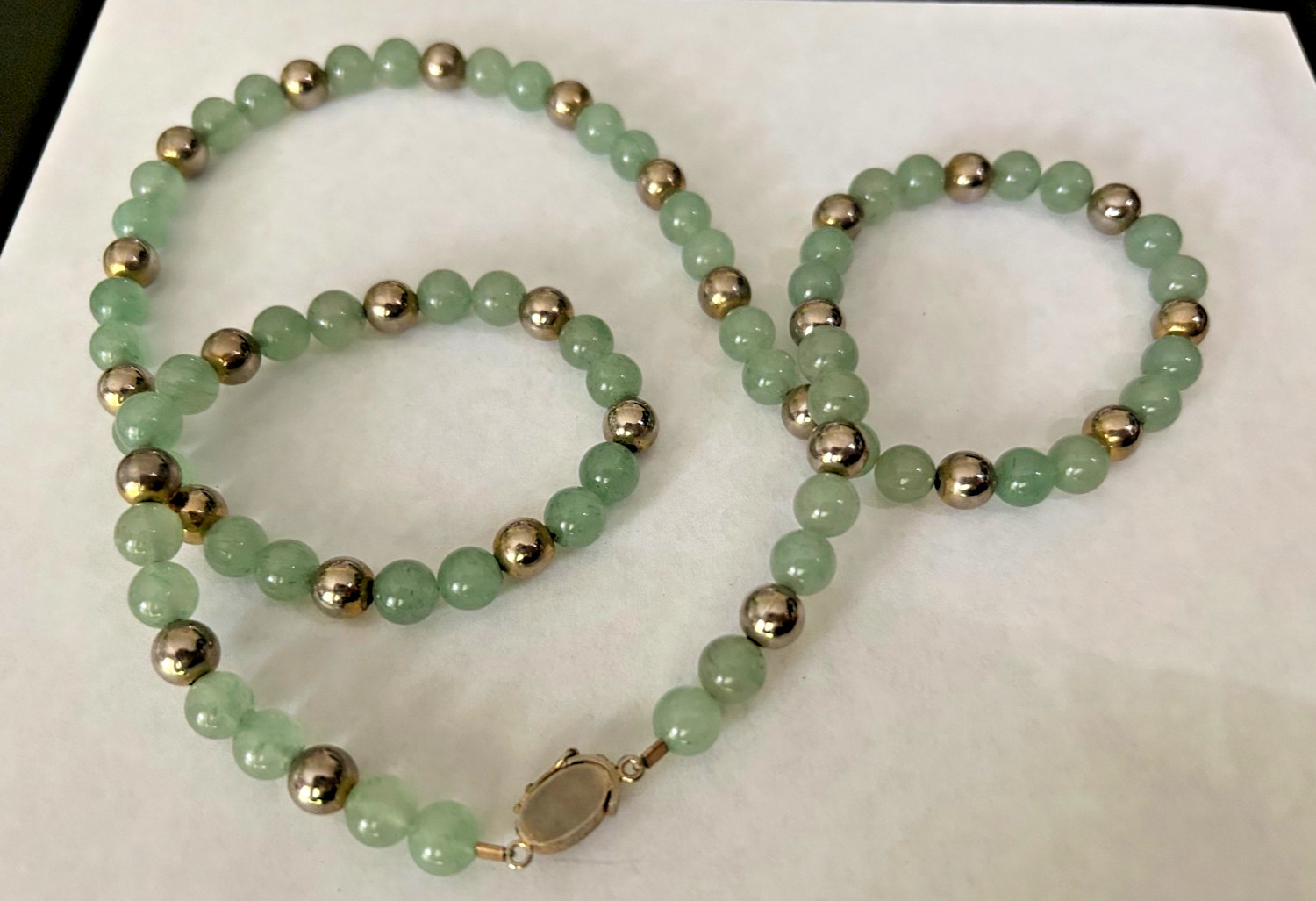 27 inch 7 MM Jade Bead Necklace with Gold Tone Spacers and Clasp