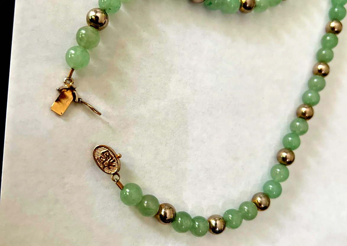 27 inch 7 MM Jade Bead Necklace with Gold Tone Spacers and Clasp