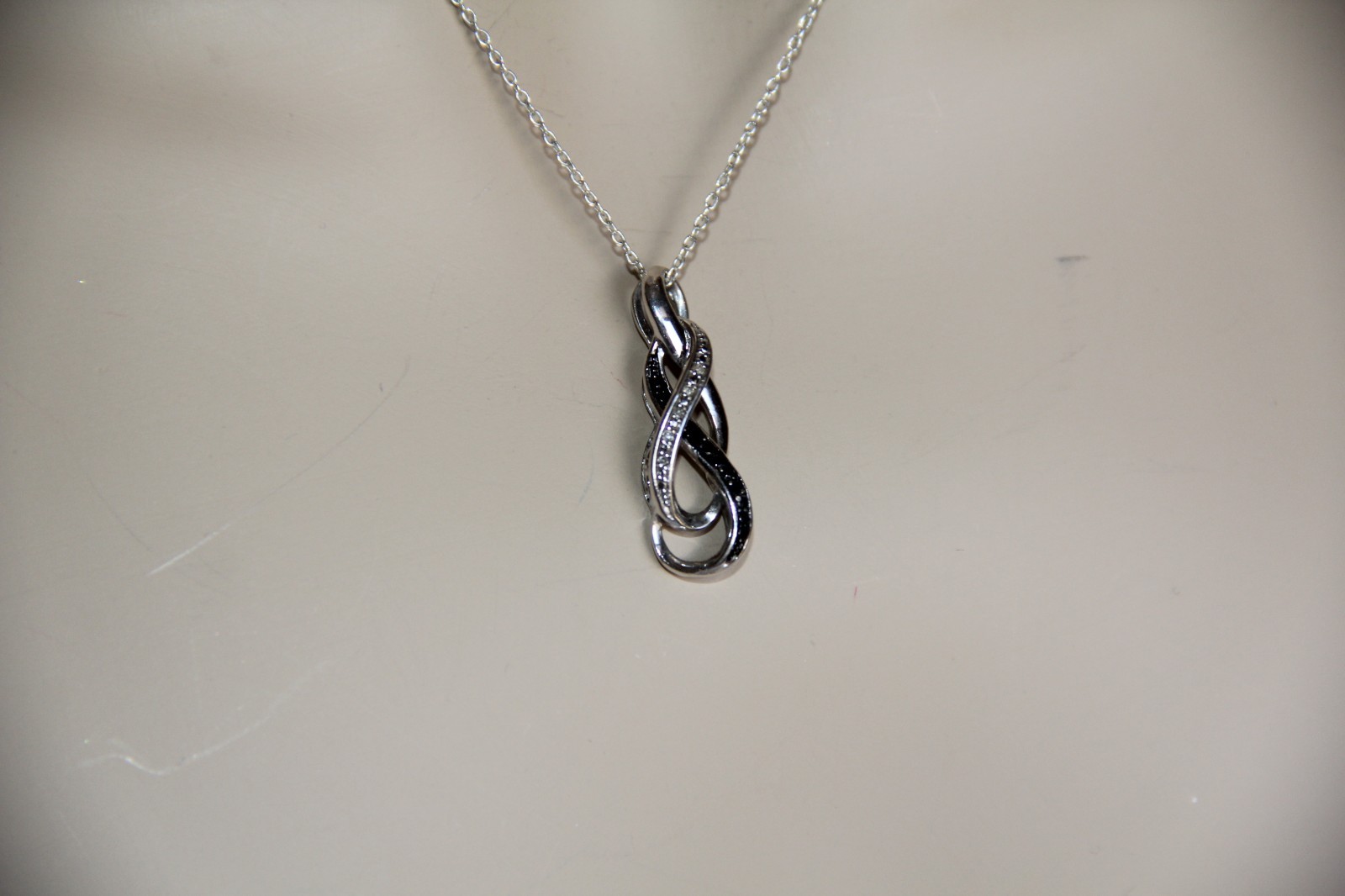 Sterling Silver Black and White Diamonds Infinity Pendant Necklace