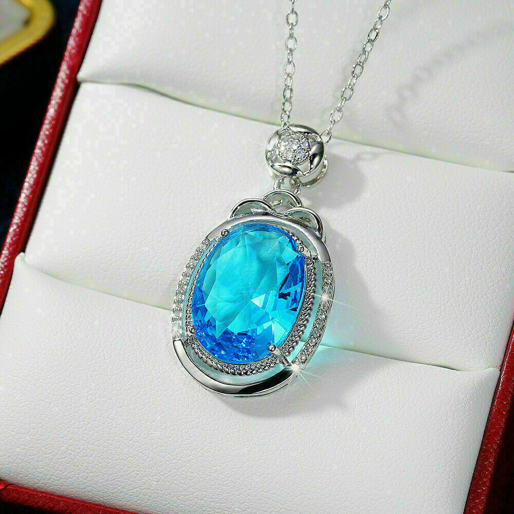 3Ct Oval Simulated Blue Topaz Diamond Pendant 14K White Gold Over Free 18′ Chain