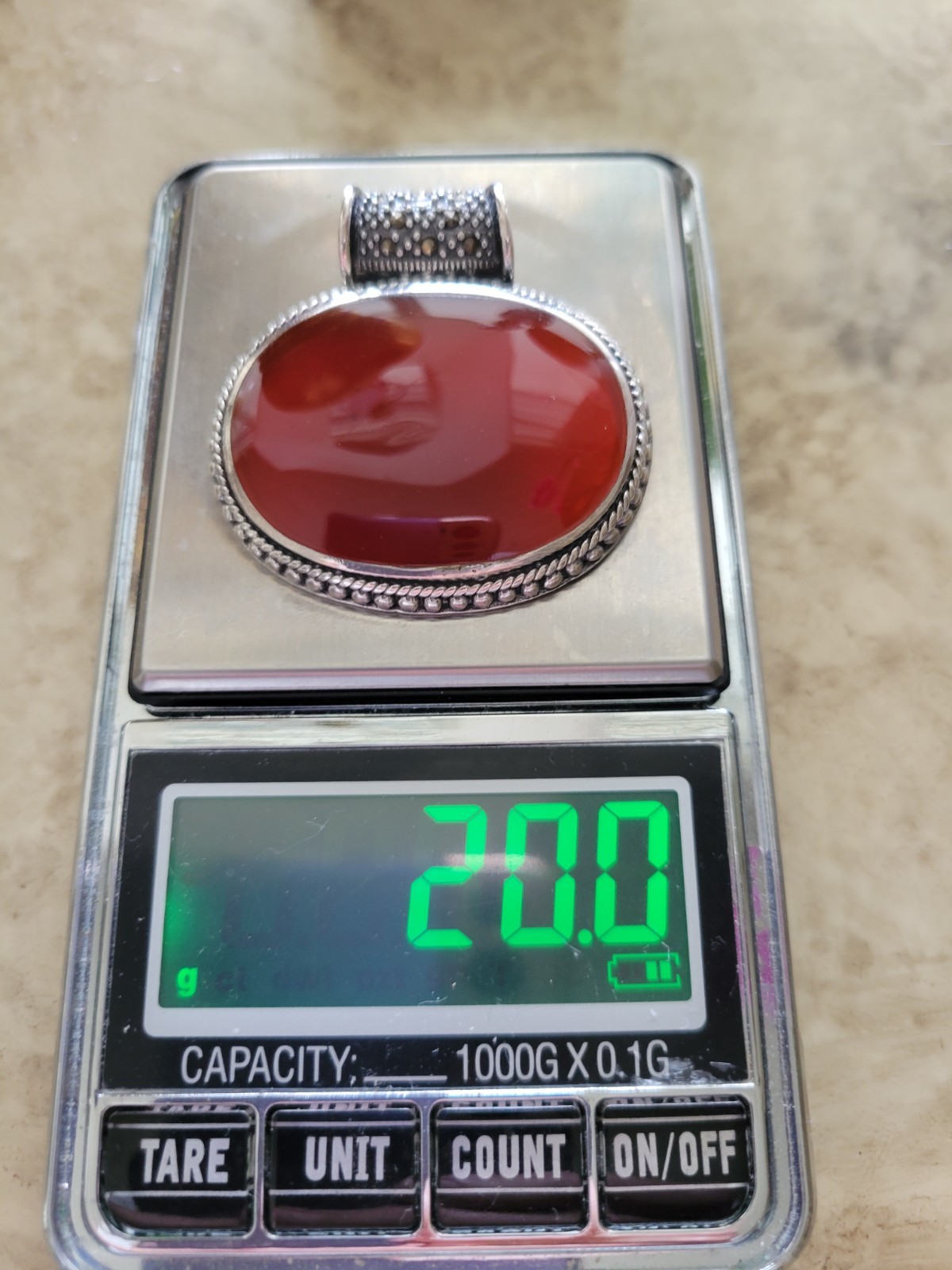 FINE CARNELIAN OVAL PENDANT, STERLING/ LARGE ROUND MARCASITE BALE