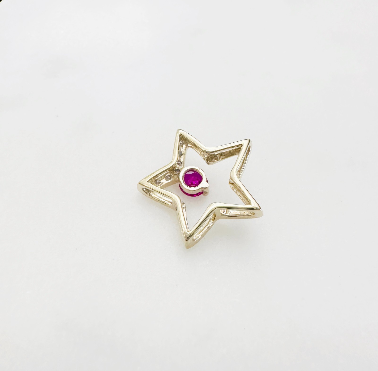 Solid 10K Yellow Gold .25ct Ruby & 7 Diamond Open Star Pendant 16mm, 1.2g