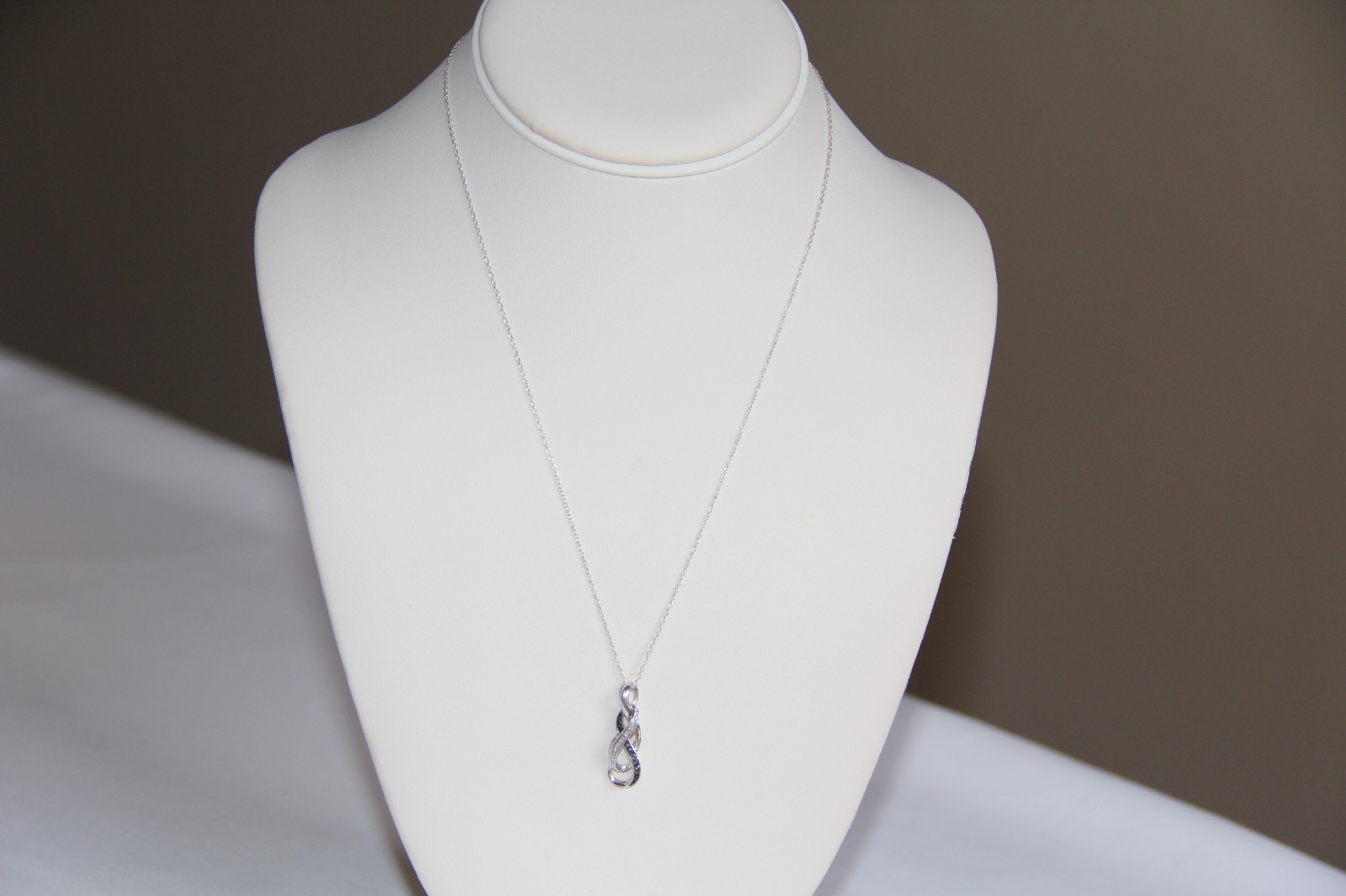 Sterling Silver Black and White Diamonds Infinity Pendant Necklace