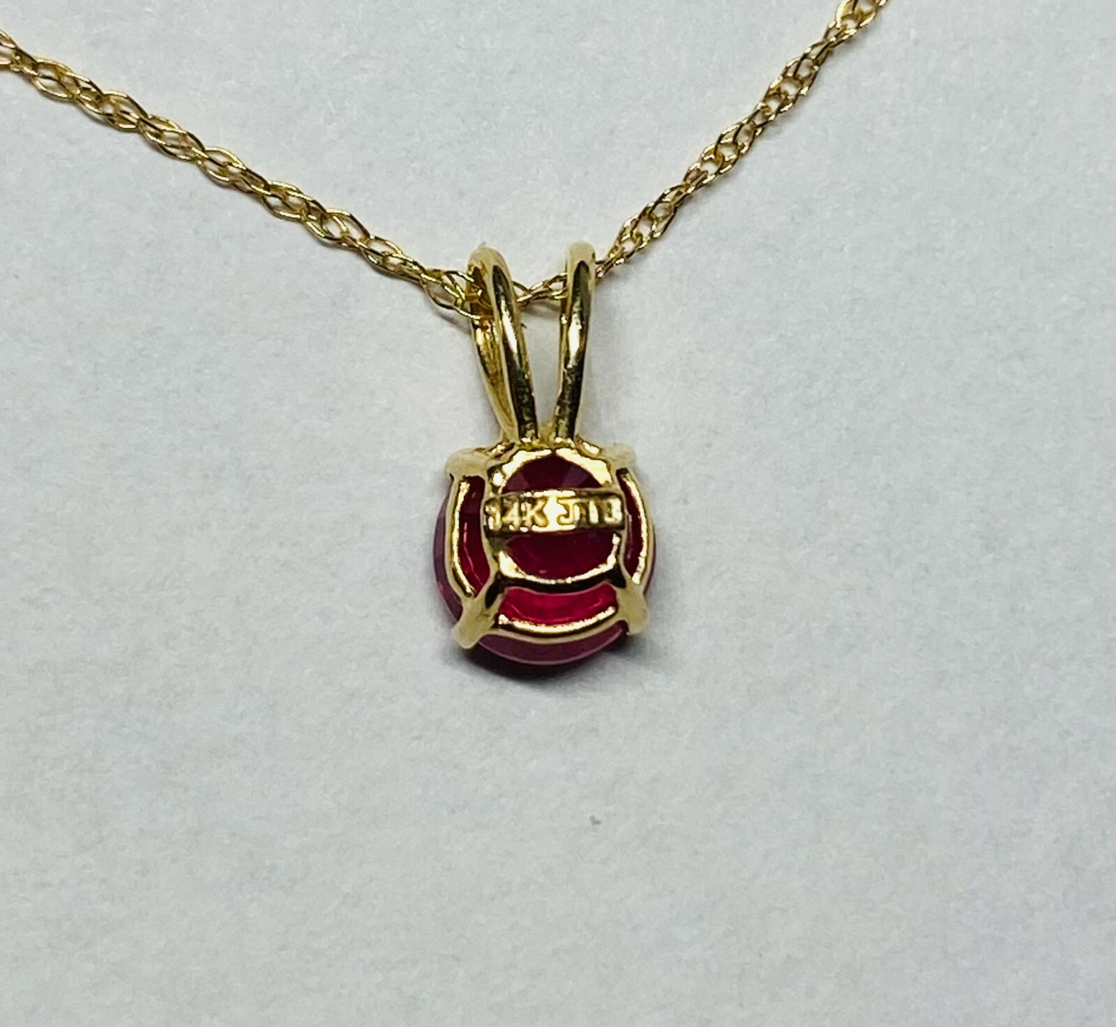14K Genuine 4mm Round Ruby Pendant (Available with or without chain)